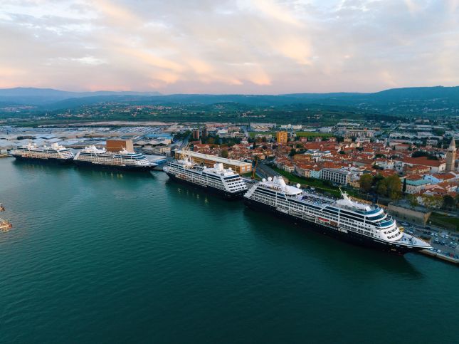 Cruise ships docked along Koper's waterfront in early evening light